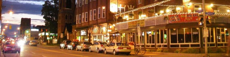 Photo of Ottawa street including cars and restaurants.