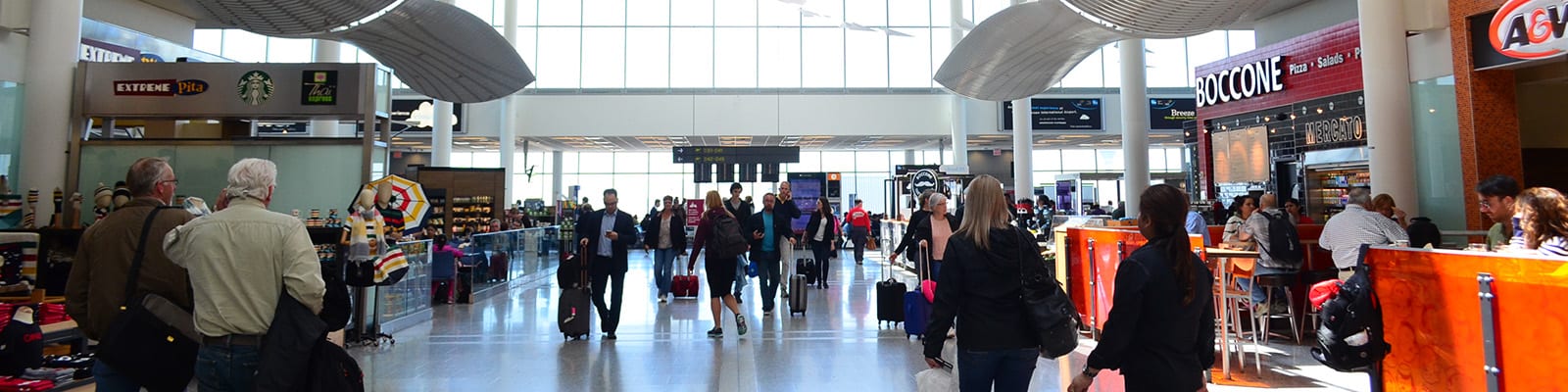 People talking around Pearson Airport.