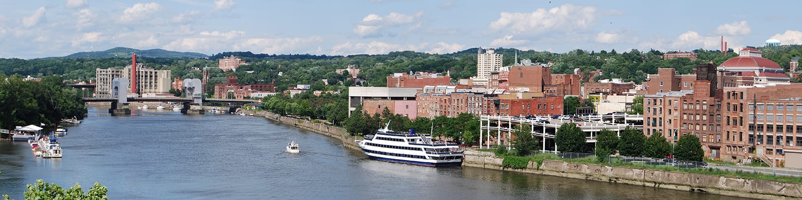 A body of water with buildings on the right side of the frame.