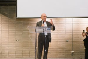 Person making a speech and the podium.