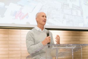 Person making a speech and the podium.