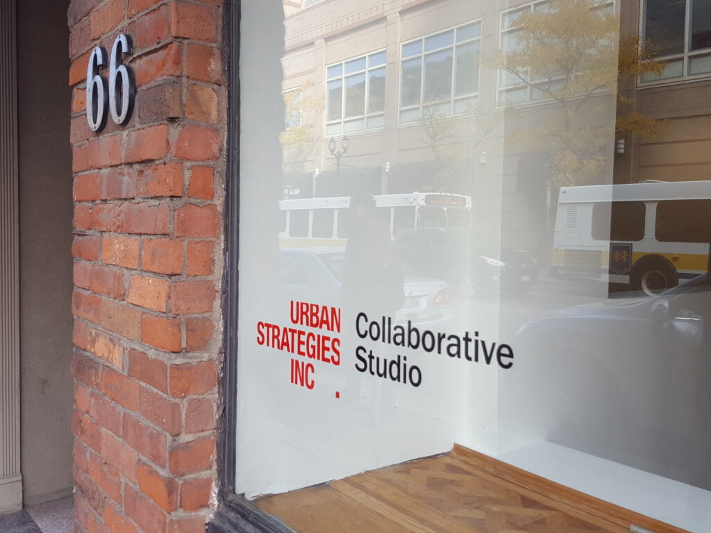 Window of Urban Strategies Collaborative Studio sign