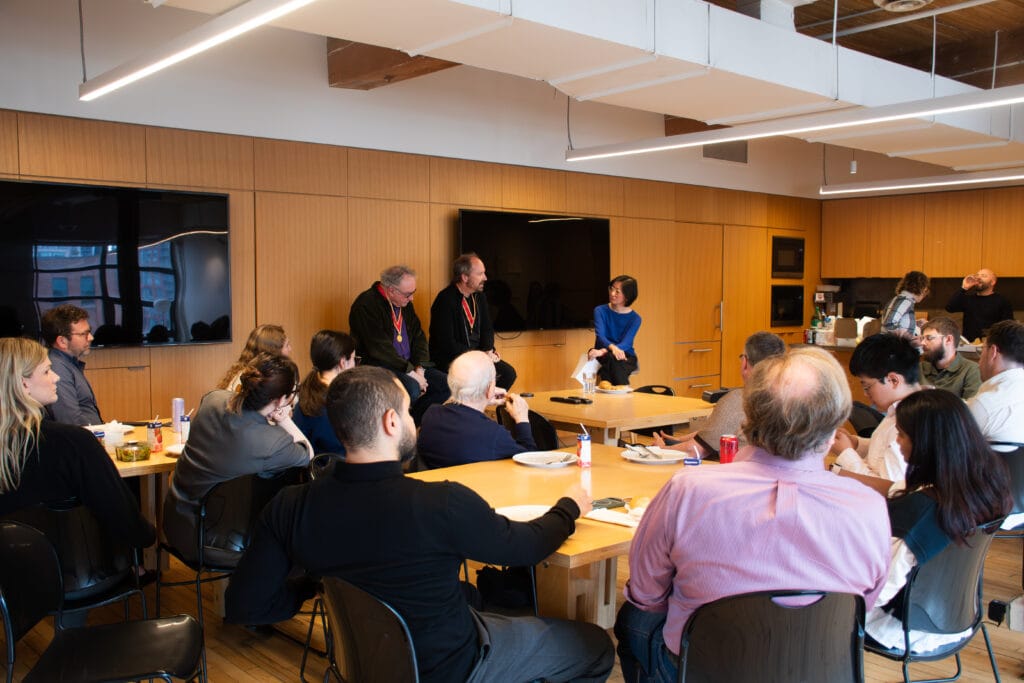 Yiwen interviewing RAIC Fellows Michel and Eric, to a group of urban strategist.